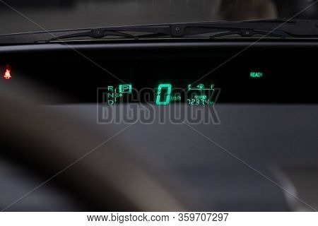 Novosibirsk, Russia - April 02, 2020:   Toyota Prius,  Dashboard Of The Car Is Illuminated By Bright
