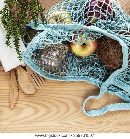 Net Bag With Reusable  Glass Jars, Fruits And Bamboo Cutlery. Zero Waste Concept. Eco Friendly. Flat