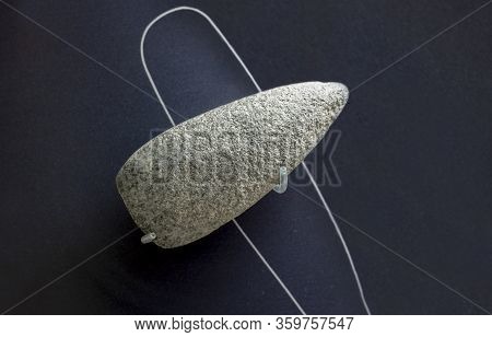 Barcelona, Spain - Dec 27th, 2019: Argaric Culture Diorite Axe. 2200 Bc. Catalan Museum Of Archaeolo