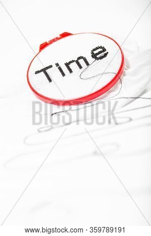 Word, Time Is Embroidered With Beads, With A Stretching Thread. Which Depicts The Passage Of Time.
