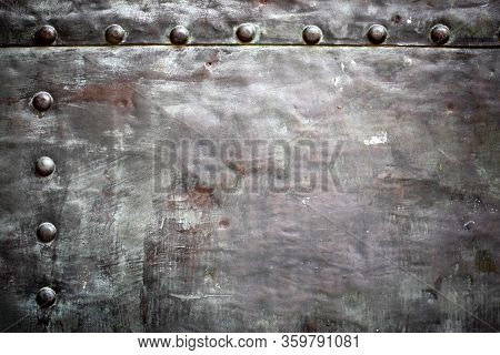 Black Grunge Metal Plate Or Armour Texture With Rivets As Background