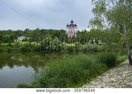 Beautiful View Of Curchi Monastery With Lake On The Foreground, Moldova