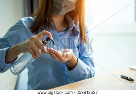 Bussiness Worman Work From Home Wearing Protection Mark In Covid-19 Virus Situation. Her Working In 