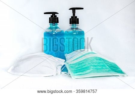Cloth And Surgical Face Masks With Alcohol Hand Sanitizer Gels For Protecting Covid-19 Virus Inflect