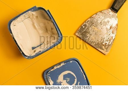 Filler - Wood Filler Or Crack Filler Over Yellow Background