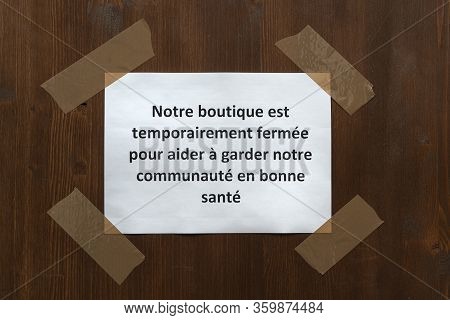 A Sign Attached To The Door With The Words 