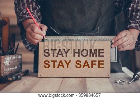Wfh: Carpenter Working From Home. Stay Home Stay Safe Woodwork Concept. Social Distancing And Physic