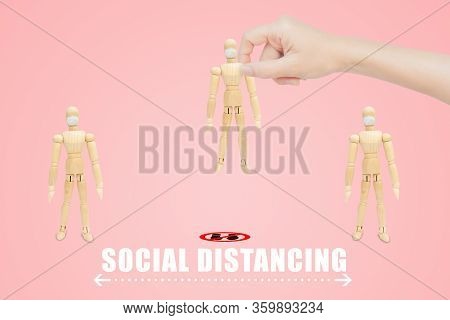 Corona Virus And Social Distancing Concept : Hand Holding People And Taking Out From Row Of People T