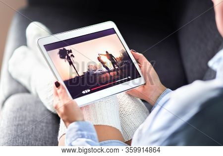 Streaming Movie With Vod Service. Woman Watching Online Tv Series Stream. Video On Demand App In Tab
