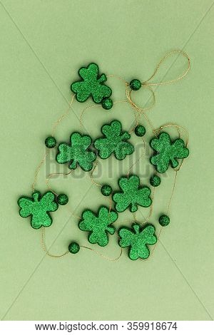 Sparkly Clowers On A Green Background For Saint Patricks Day, Traditional Irish Holiday- Image