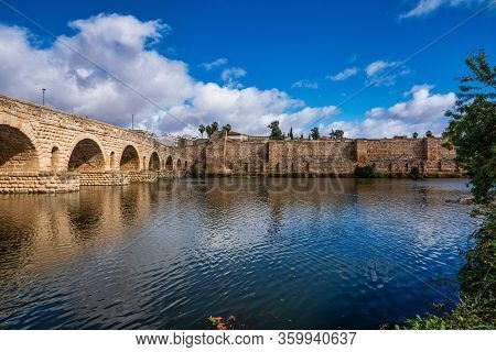 Merida, Spain - November 05, 2019: Puente Romano, The Roman Bridge In Merida. It Is The Longest Surv
