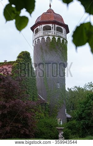 Svetlogorsk, Russia - May 17.2018: Beautiful Overgrown Water Tower , Kaliningrad Region, Russia