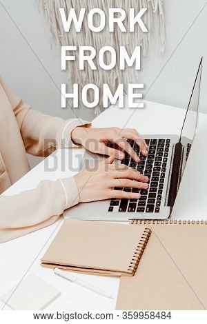 The Inscription Work At Home, Against The Background Of A Hand Writing In A Notebook Holding. The Co