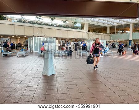 Orlando,fl/usa-3/21/20:  People Going Through Orlando International Airport Mco Tsa Security On A Sl