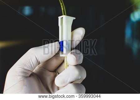 Anesthesiologist Doctors Is Adjusting Extension Tube Control Of Saline Solution Mixed Drug,corona Vi