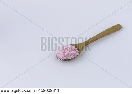 Salt Pink Aloma In Spoon Isolated On White Background, Flat Lay, Top View.