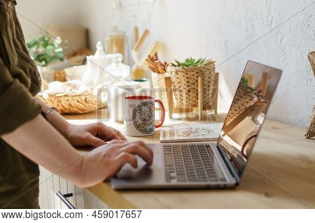 Tver, Russia-august 7, 2022. A Woman With A Laptop Is Studying Human Design. The Concept Of Studying