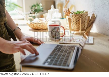 Tver, Russia-august 7, 2022. A Woman With A Laptop Is Studying Human Design. The Concept Of Studying