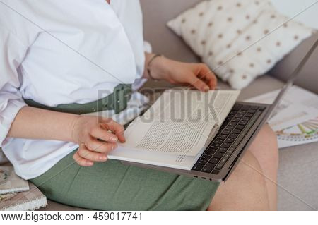 Tver, Russia-august 7, 2022. A Woman With A Laptop Is Studying Human Design. The Concept Of Studying