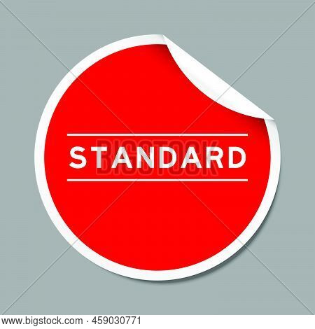 Red Color Peel Sticker Label With Word Standard On Gray Background