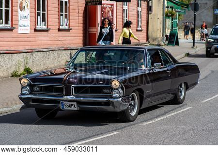 Haapsalu, Estonia - July 15, 2022. An Old Vintage Beautiful Car Of American Manufacturer Pontiac At 