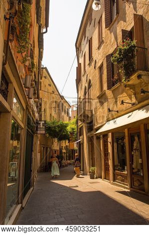 Treviso, Italy - 23rd July 2022. Via Barberia, A Popular Bar And Shopping Street, In The Historic Ce