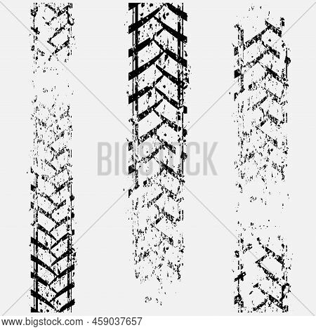Abstract Grunge Black Tire Track Lines. Brake Down Path On The Road For Different Vehicle Wheels Iso