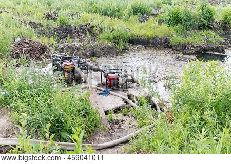 Drainage Of A Reservoir, Swamp, Lake With The Help Of High Pressure Water Pumps. Water Pumps Pump Wa