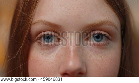 Extreme Close-up Macro Portrait Of Freckles Smiling Girl Face. Teen Beautiful Kids Eyes, Looking At 