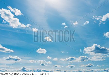 White Clouds In The Blue Sky. White Light Cloudy Heaven,good Weather. Summer Sky. Heaven And Infinit