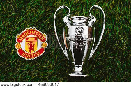 April 21, 2021, Moscow, Russia. The Emblem Of The Football Club Manchester United F.c. And The Uefa 