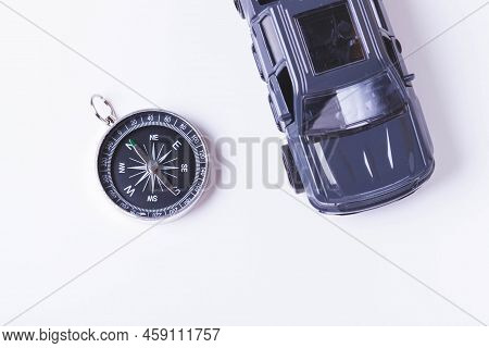 Tourist Travel By Car. Travel By Car. Compass And Car. Autotourism. Traveling Across Countries By La