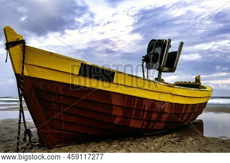 Sunset Over Baltic Sea With Fishing Boat On The Beach - Debki, Pomerania, Poland