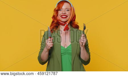 Ready To Eat. Hungry Redhead Young Woman In Green Jacket And Dress Waiting For Serving Dinner Dishes