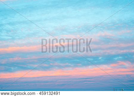 Panorama Of Sky With Pink Clouds At Sunset Or Sunrise. Abstract Background With Pink, Purple And Blu