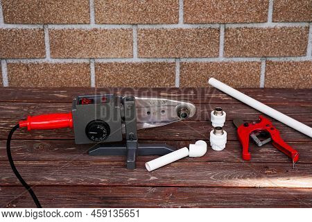 Pipes Of Sanitary Engineering Welded Plastic. Ppr Pipe Welding Tool