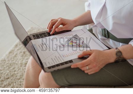 Tver, Russia-august 7, 2022. A Woman With A Laptop Is Studying Human Design. The Concept Of Studying