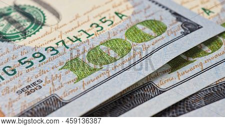 American Banknotes Of One Hundred Dollars. Fragment Of Bills Close-up. New Sample Money. Focus On Th