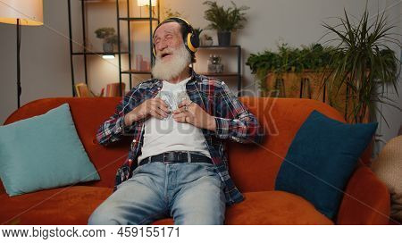 Successful Rich Senior Businessman Grandfather Man Holding Money Cash Cheering Up With High Profits,