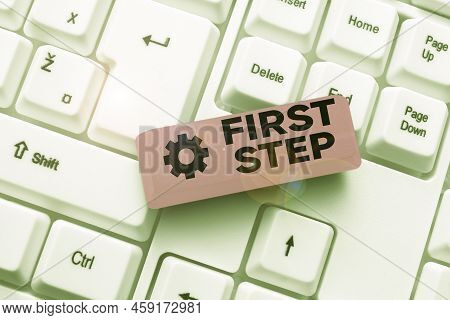 Hand Writing Sign First Step. Business Approach Pertaining To The Start Of A Certain Process Or Begi