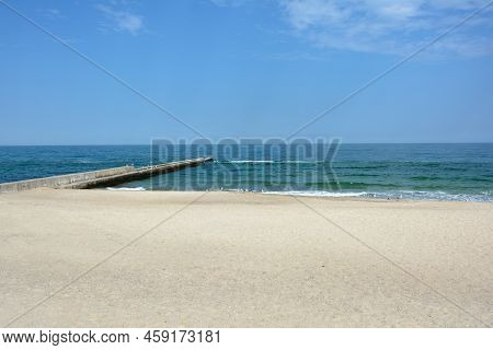 The Black Sea Coast, An Empty Beach On The Odesa Seashore. The Deserted Embankment Of The Golden Coa