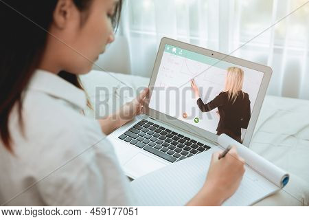 Homeschooling Concept, Teen Student Stay Home Using Onling Classroom Or E-learning System For Self E