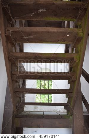 An Old Wooden Stairway Of A Viewing Tower