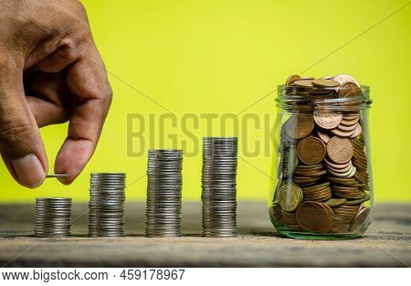 Save Money And Account Banking For Finance Concept, Hand Bank With Coin On Blurred Background, Save 