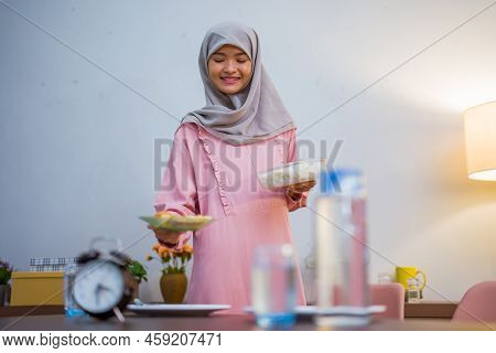 Muslim Woman Wake Up Early To Have A Morning Breakfast