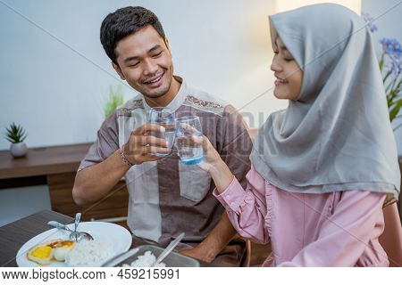 Muslim Couple Having Breakfast Or Sahur Early Morning