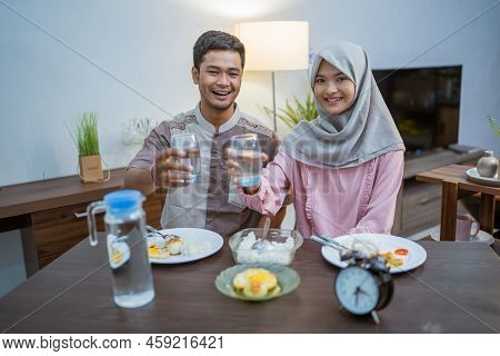 Muslim Couple Having Breakfast Or Sahur In The Morning