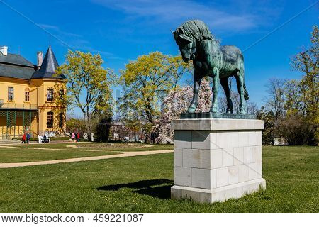 Slatinany, Czech Republic, 17 April 2022: Classical Chateau Or Romantic Yellow Castle Surrounded By 