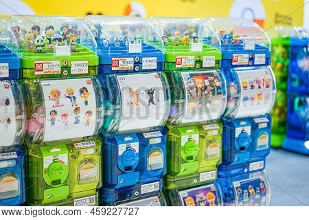 Bangkok, Thailand - 11 Feb 2022, There Are Light Green And Blue Gashapon Machines, A Variety Of Vend
