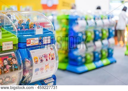 Bangkok, Thailand - 11 Feb 2022, There Are Light Green And Blue Gashapon Machines, A Variety Of Vend